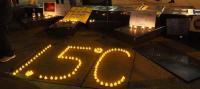 1.5 degrees C. spelled in tea candles
